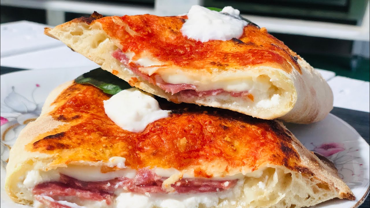 Calzone prosciutto e funghi freschi | La Brasserie Amarcord