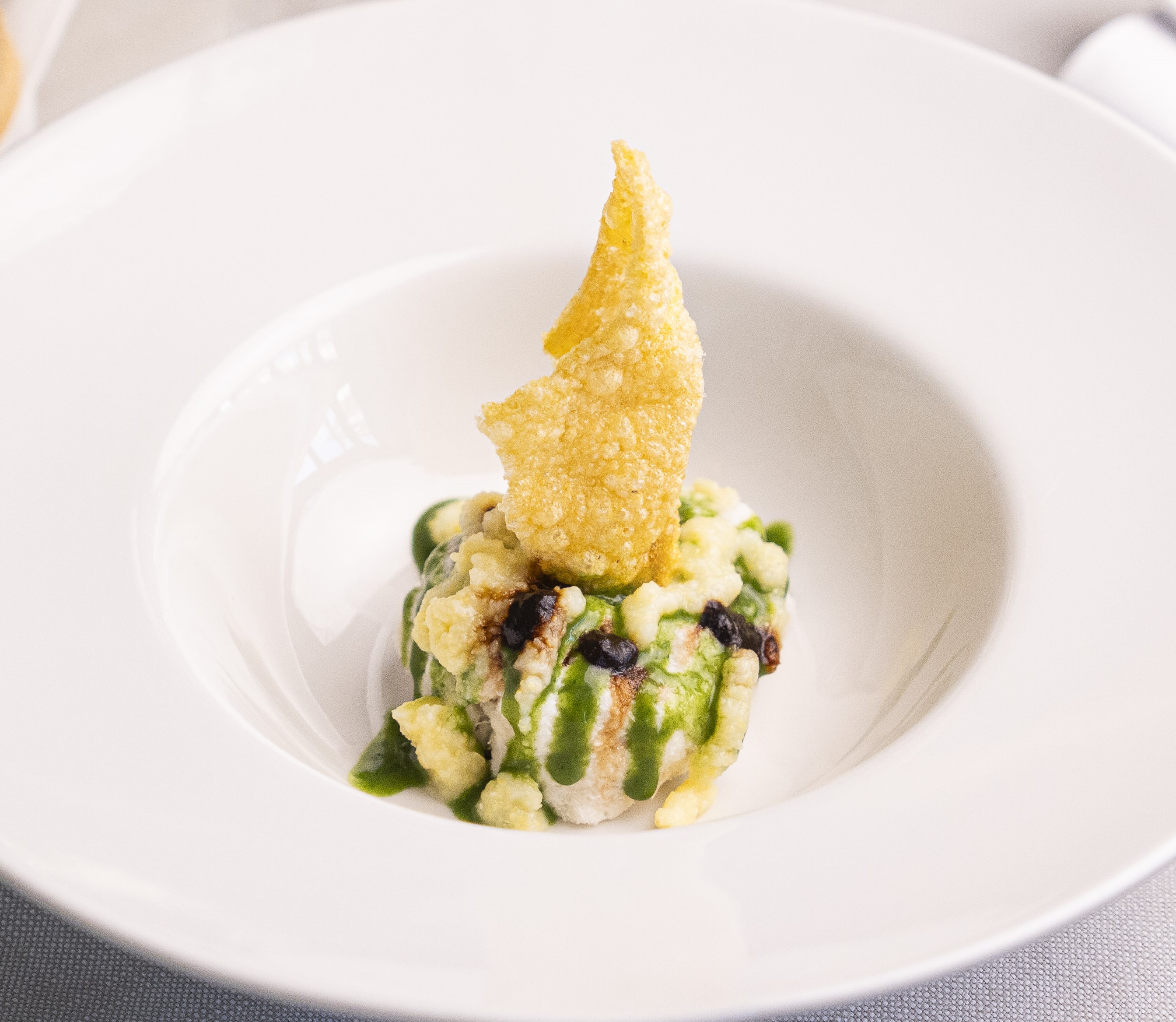 Baccala' mantecato,cicoria,aglio nero e mais | Ristorante Protti