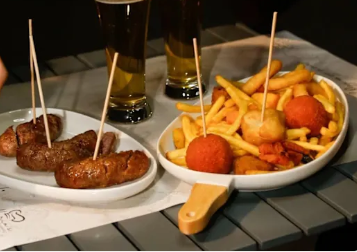 Alette di pollo con salsa BBQ e patatine  | Mario's - Focacceria Paninoteca